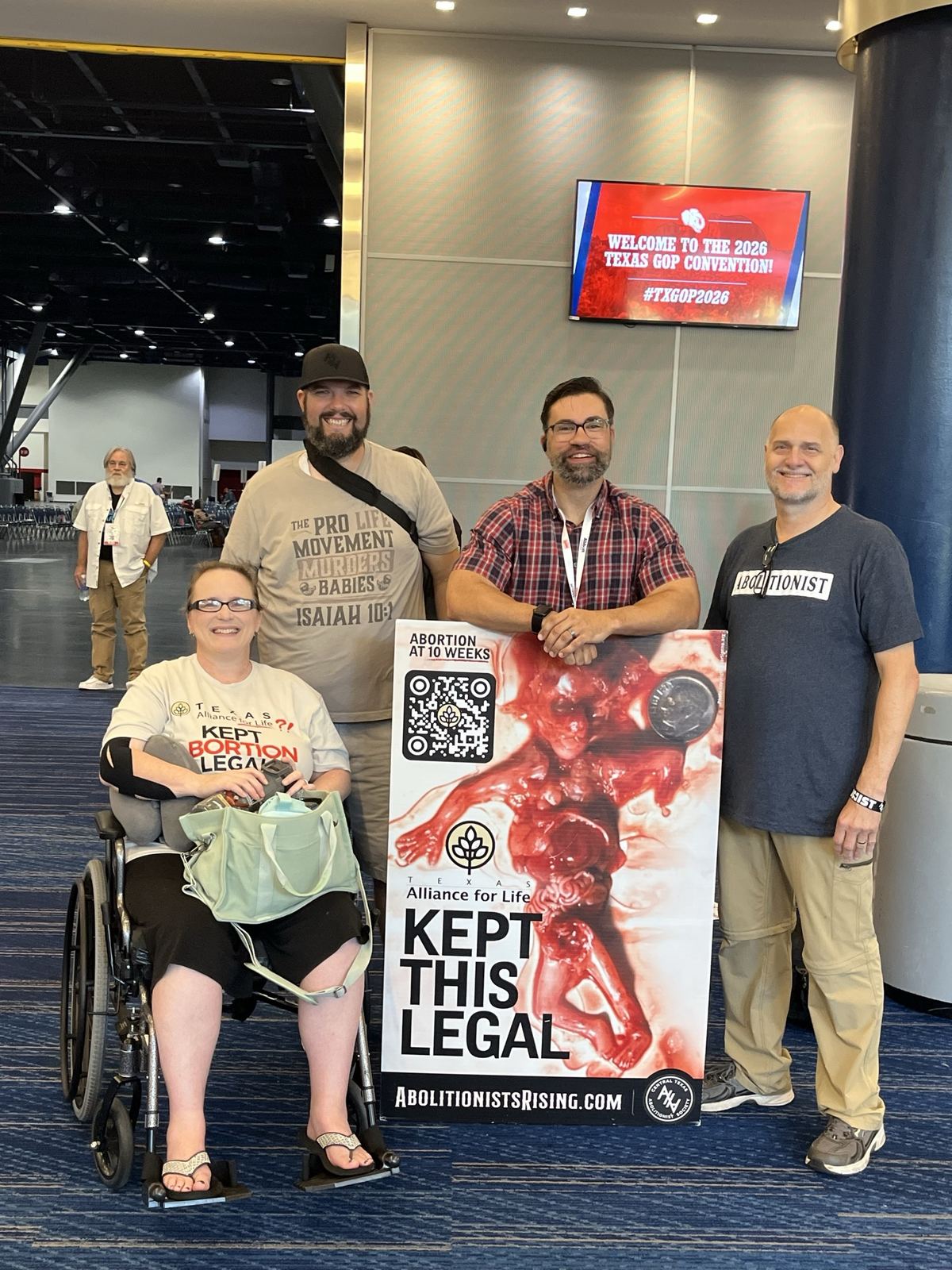 Abolitionists with a sign at the 2026 Texas GOP Convention